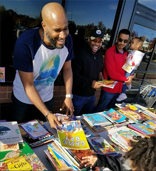 This Organization, Ran By 6 Black Men, Has Donated More Than 30,000 Books to Children Worldwide – But They Need More Volunteers and Financial Support