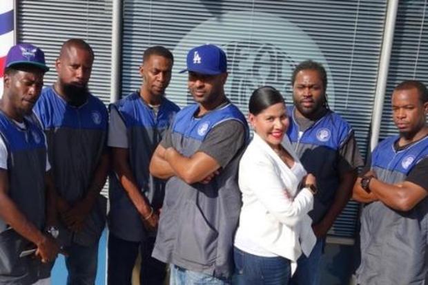 Barbershop owner raises funds to pay off high school seniors’ debts so they can graduate